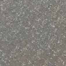 Gray textured surface with scattered white speckles.