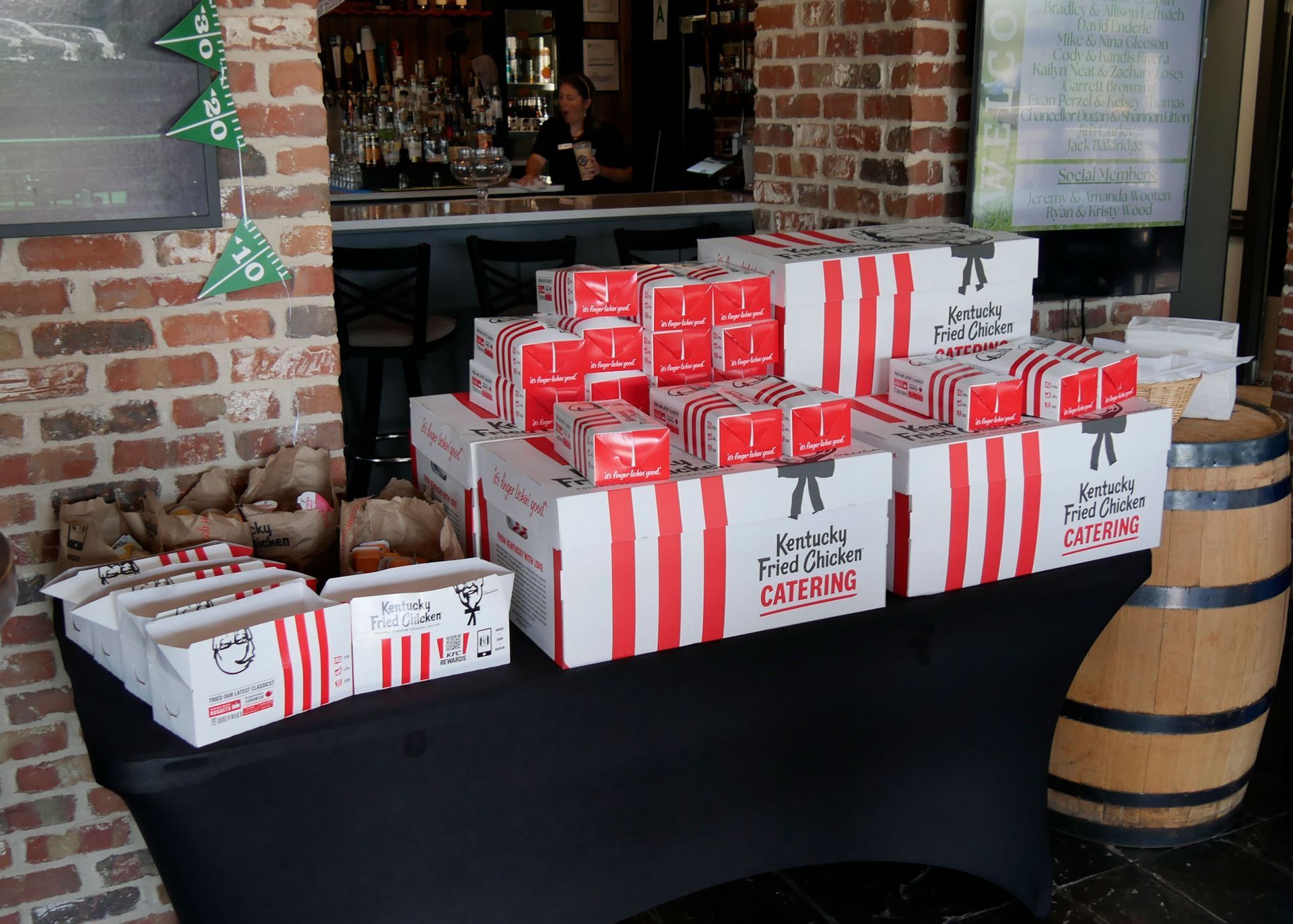 A stack of box lunches provided by KFC.