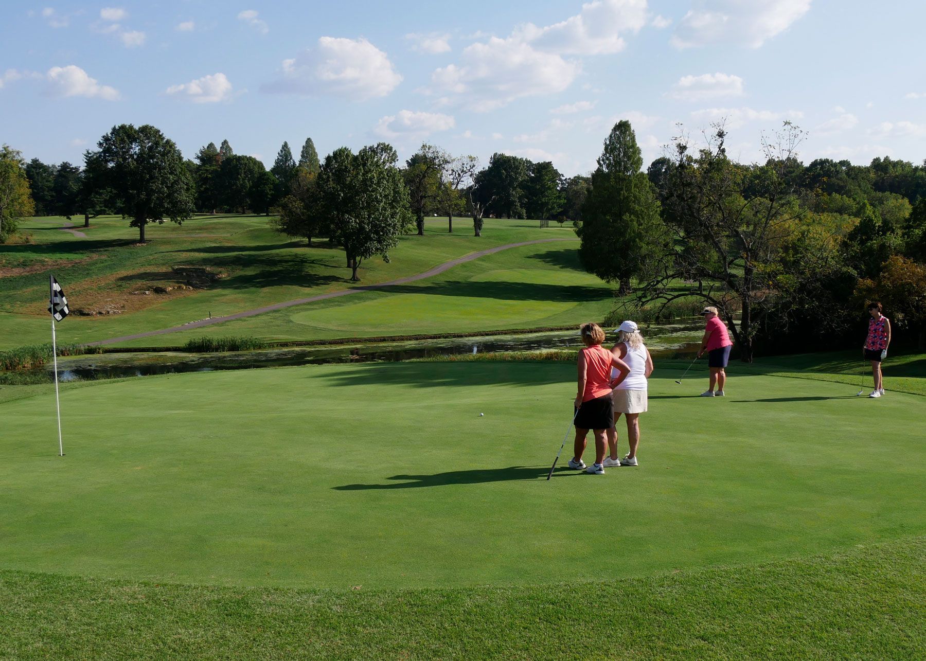 Diane Nelson’s team on the putting green.
