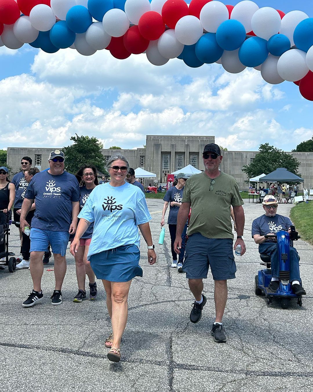 Walkers under the balloon arch at Walking for Dreams.