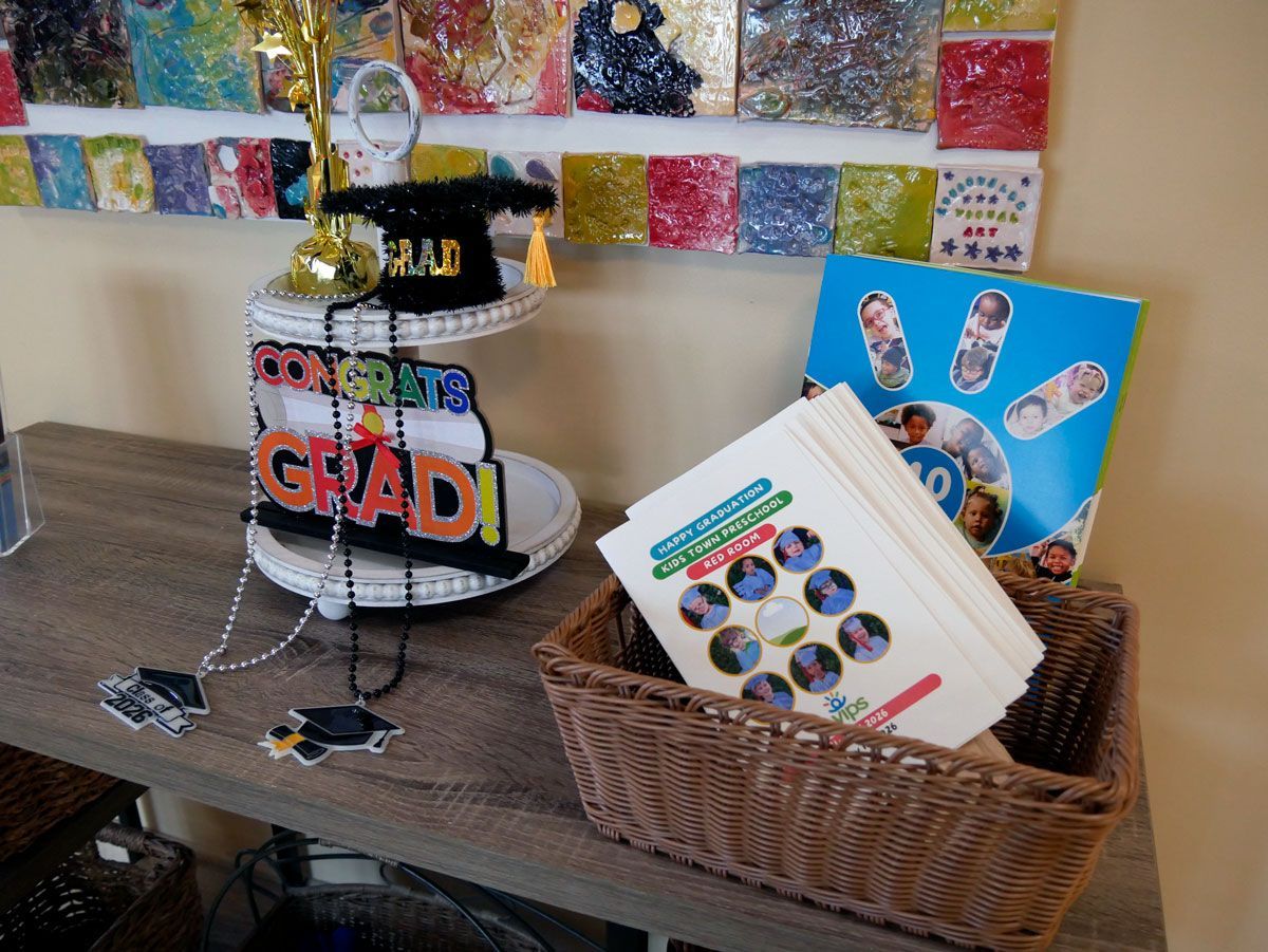 Graduation display on a table in the lobby of VIPS.