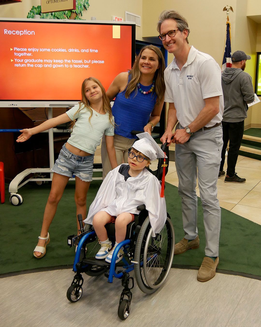 A family poses for a photo after the ceremony.