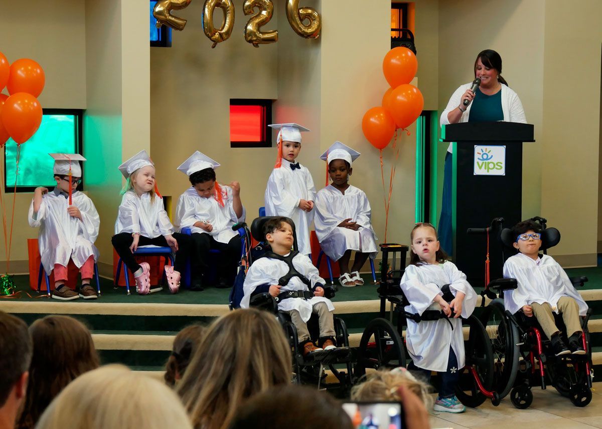 Miss Ashley addresses the graduates.