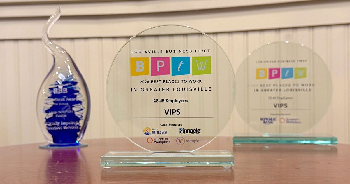 The 2026 Louisville Business First's Best Places to Work on a table with the 2025 award.