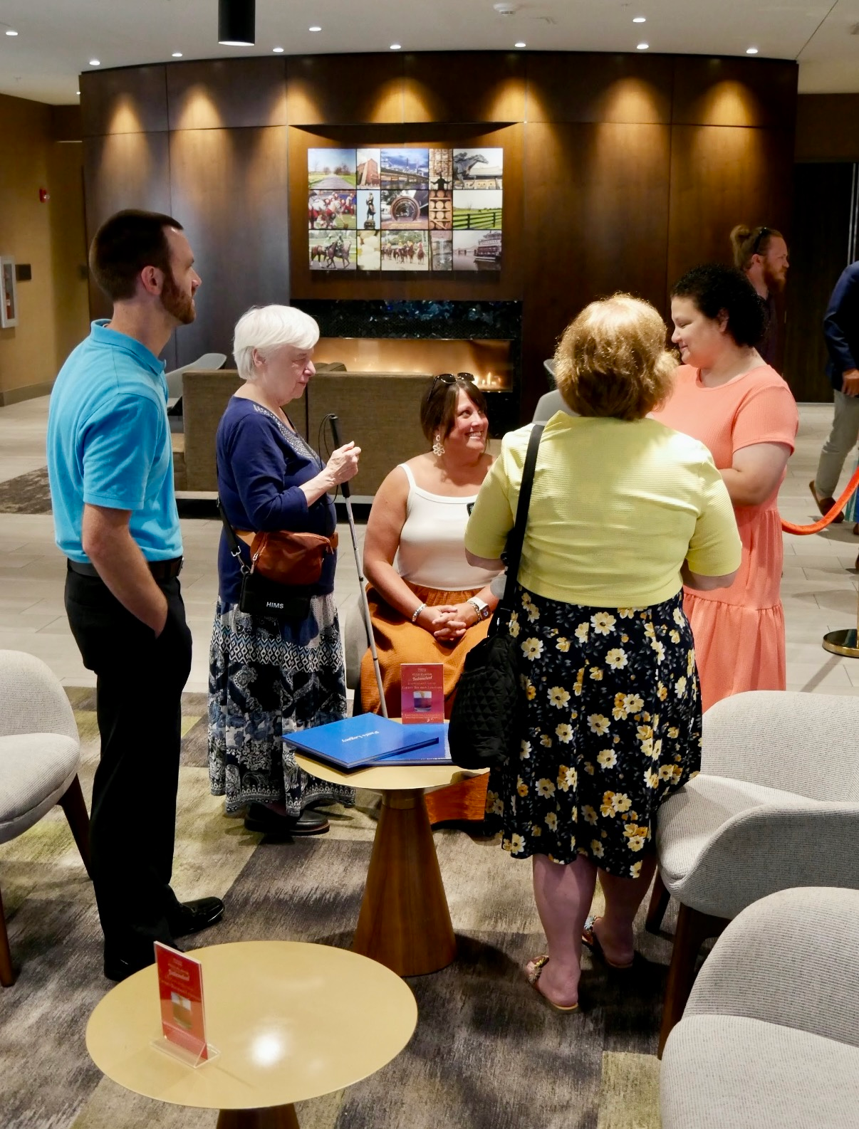 group of people talking in a circle.