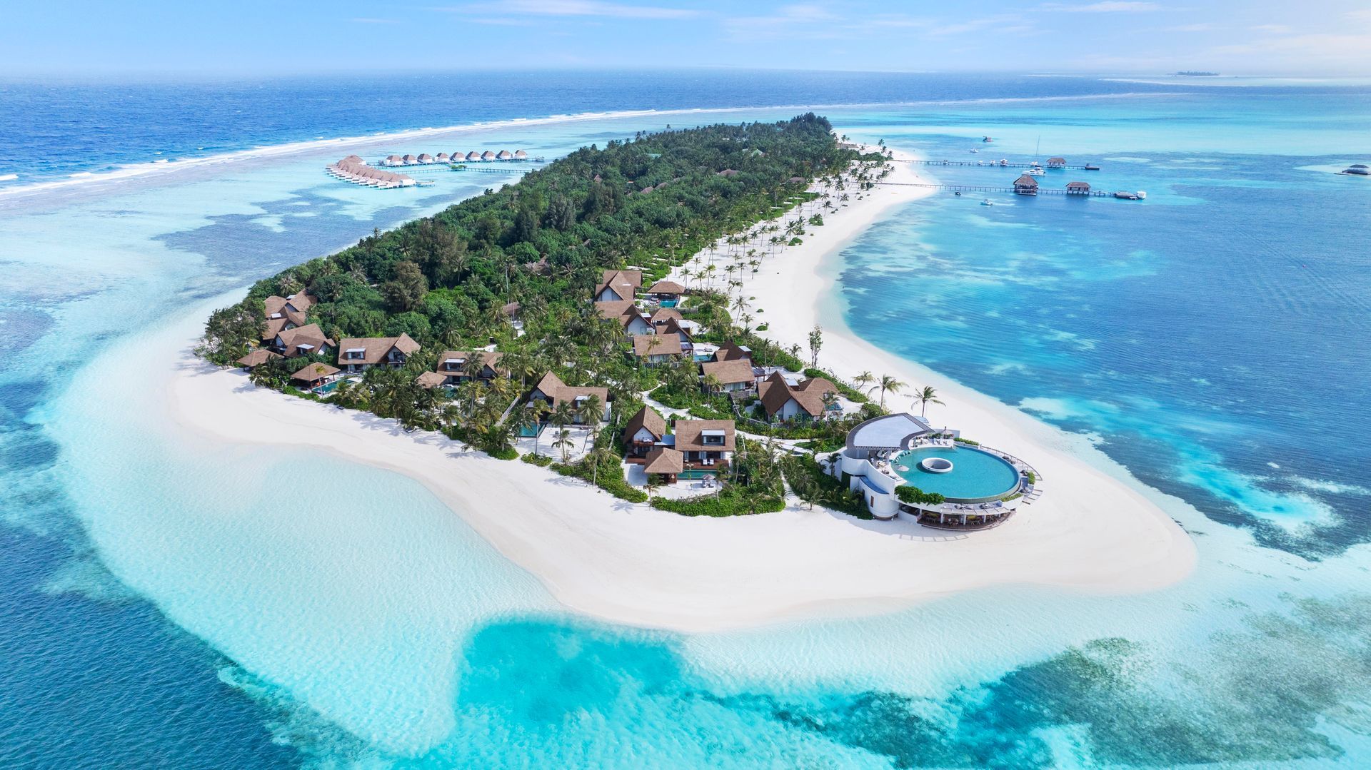 Aerial view of a Six Senses Kanuhura, a sustainable Maldivian island resort