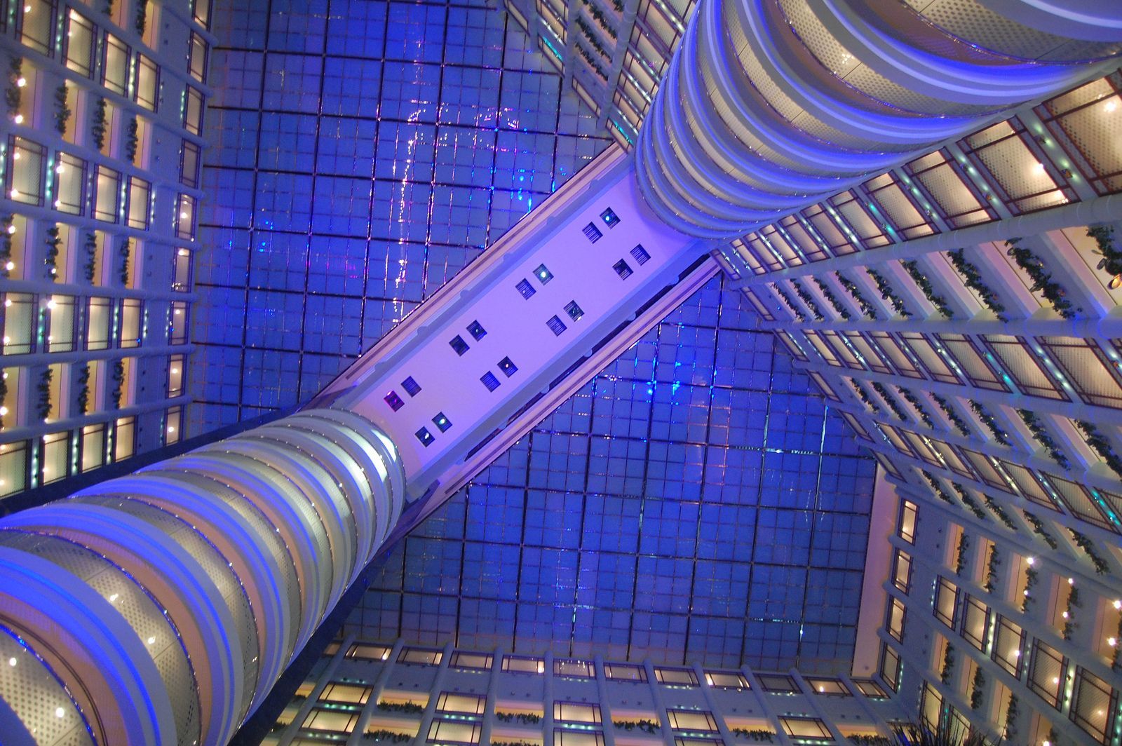 Looking up at the ceiling of a building with blue lights