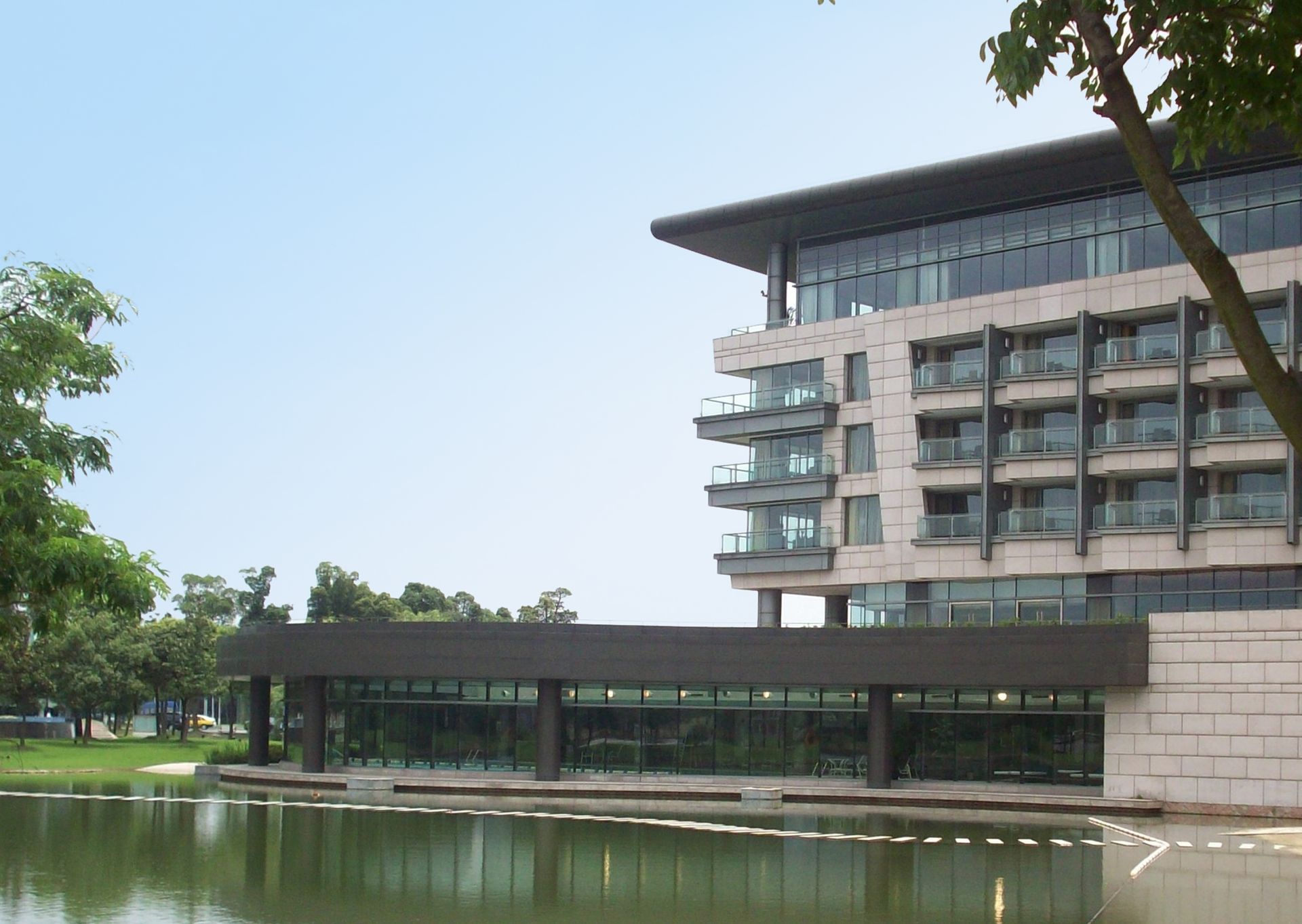 A large building next to a body of water