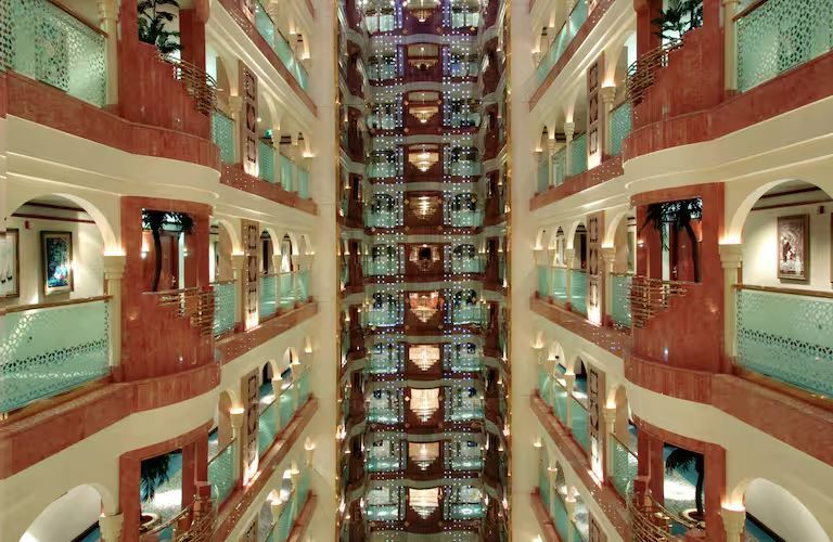A large building with a lot of windows and balconies