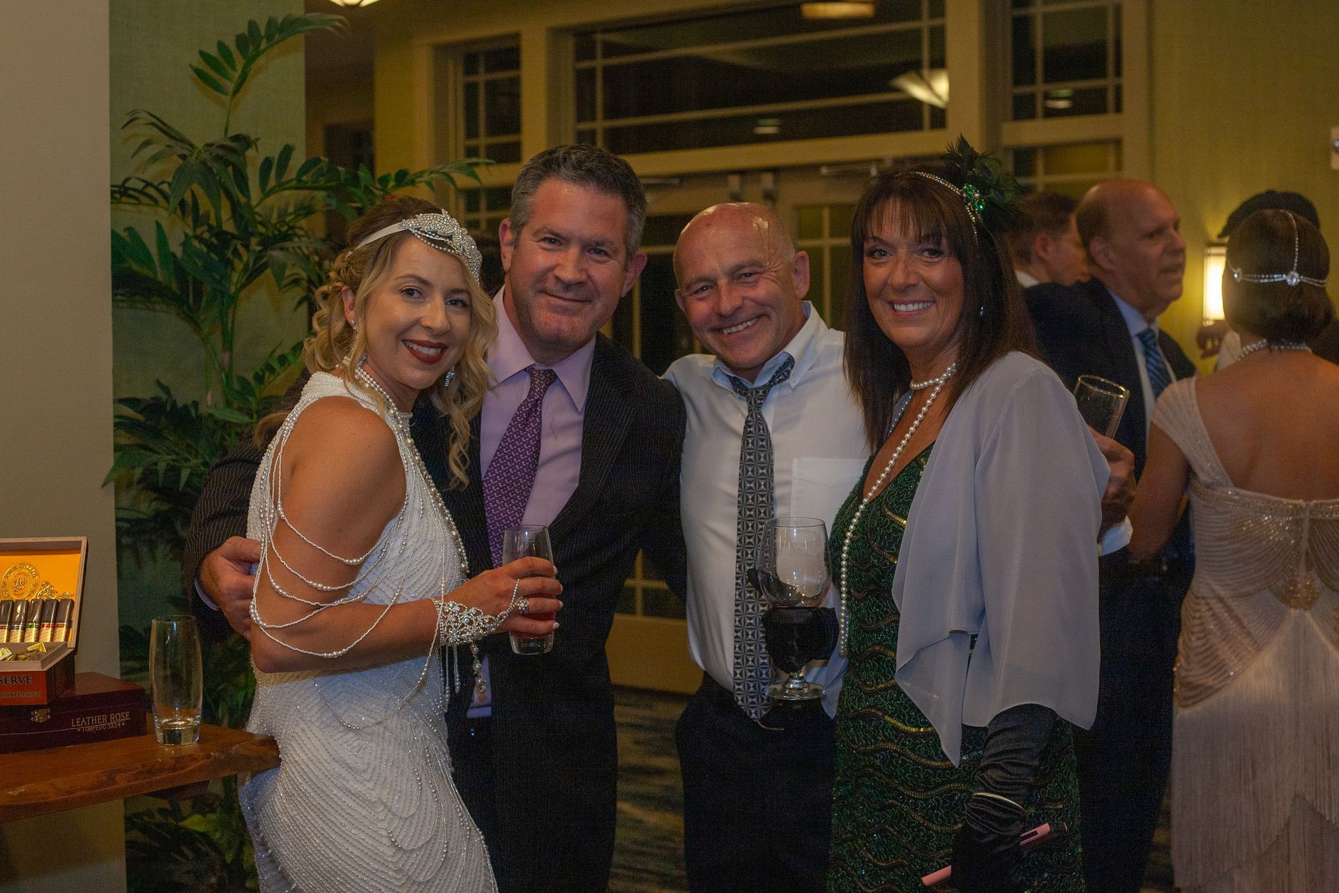 A group of people posing for a picture at a party