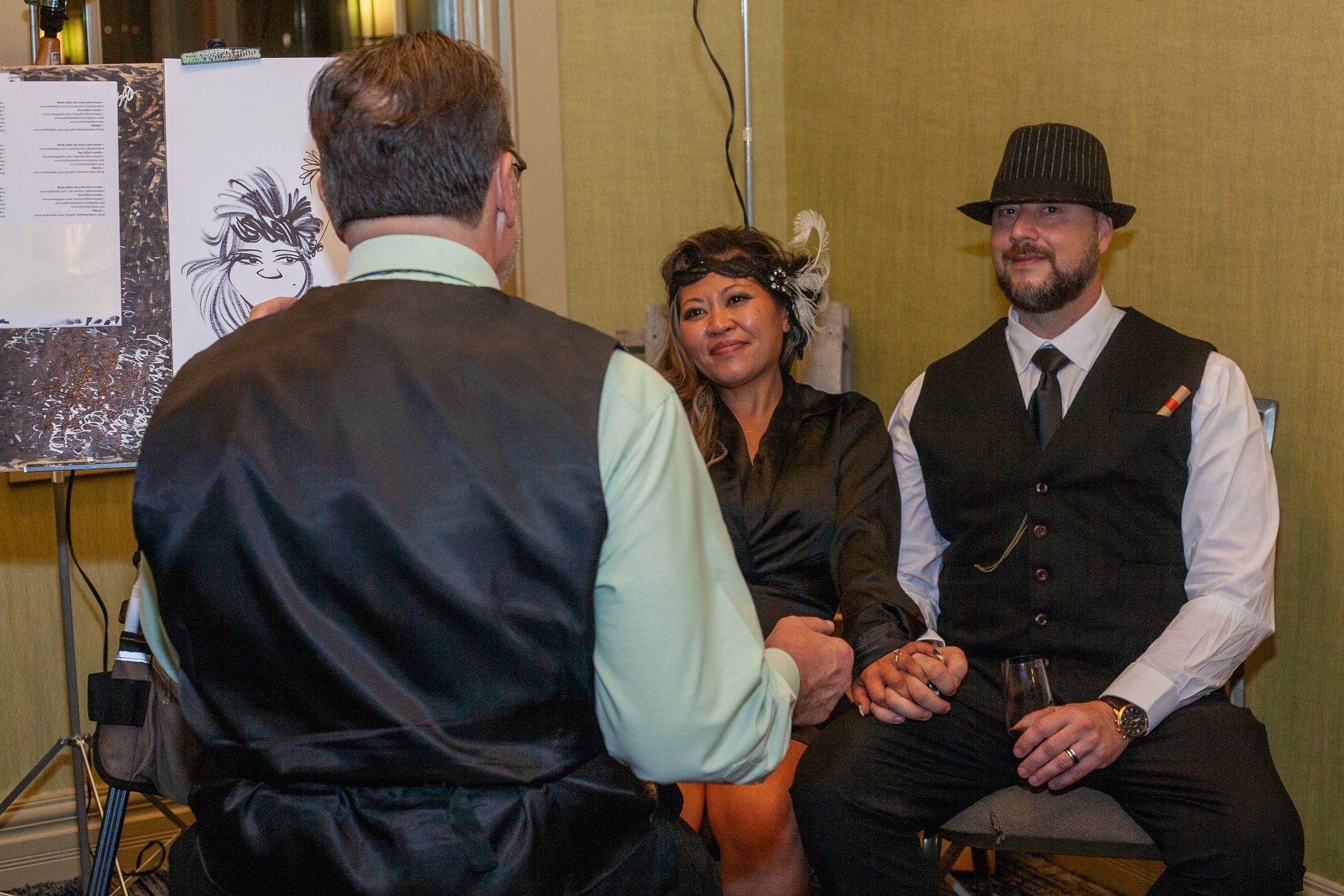 A man and a woman are sitting next to each other in a room.
