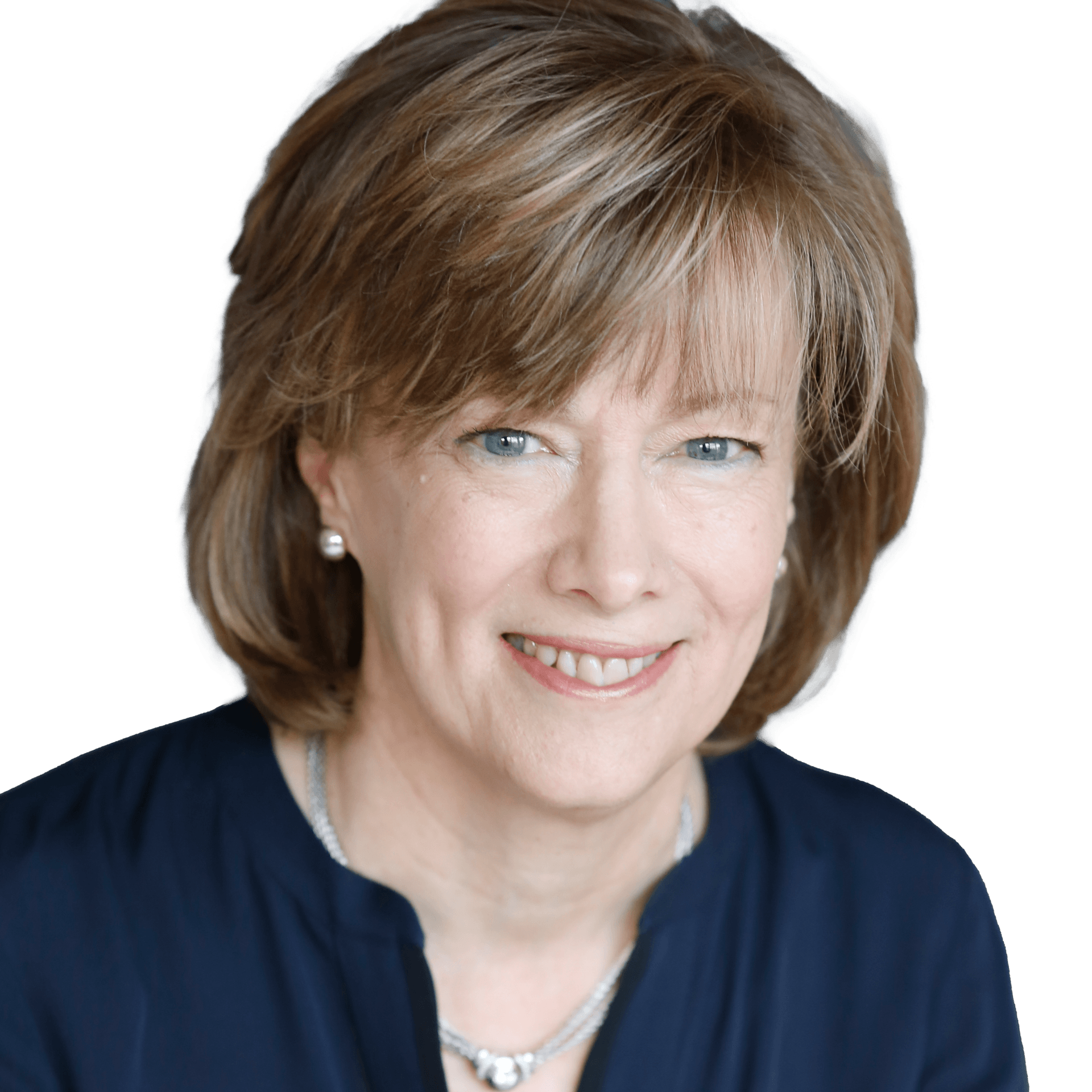 Woman with short brown hair, smiling, wearing a blue shirt and silver necklace, against a white background.