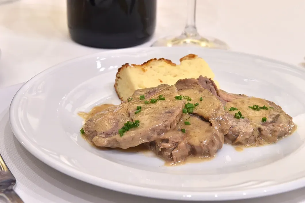 Veal Scallopine With Bread Roll and Red Wine — Romanas Italian Restaurant in Mermaid Beach, QLD