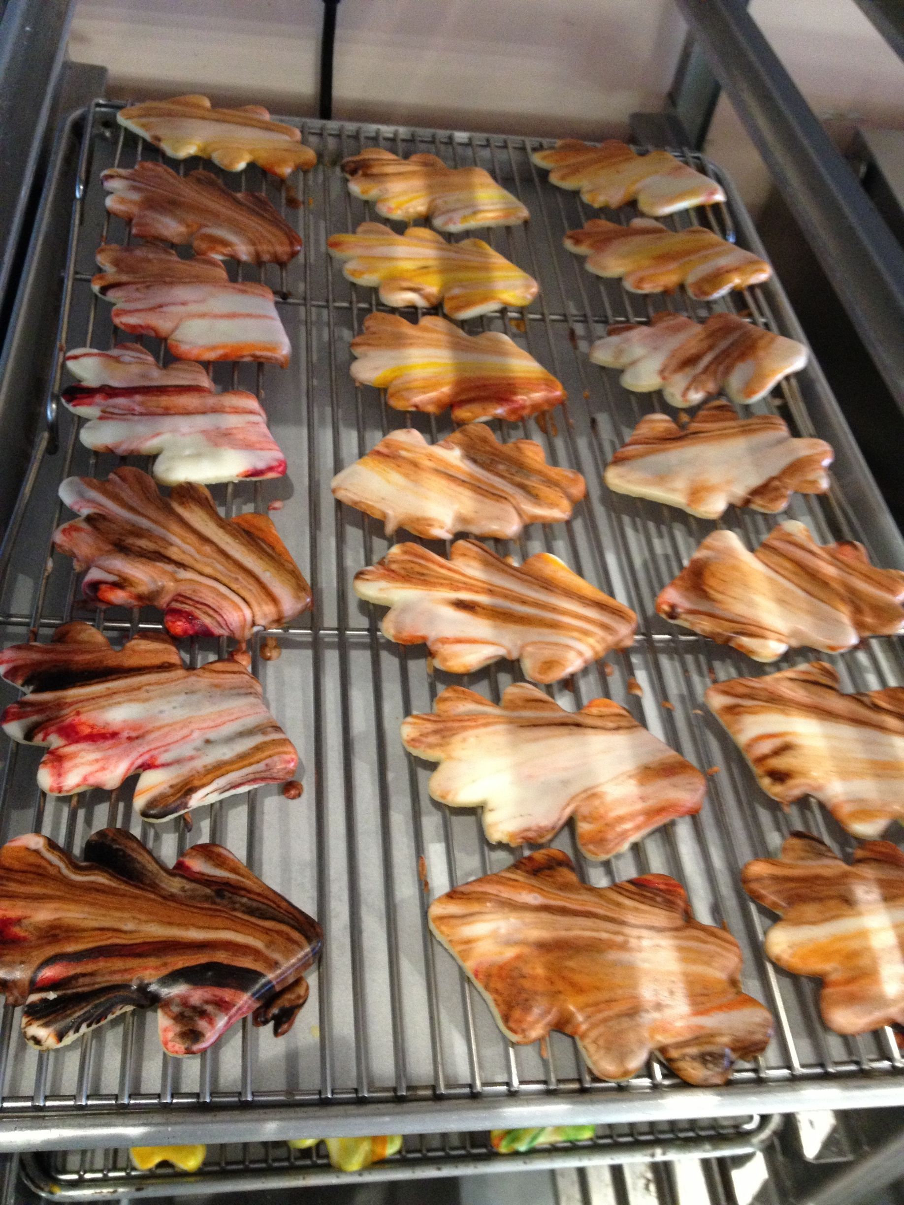 a bunch of meat is sitting on a metal rack .