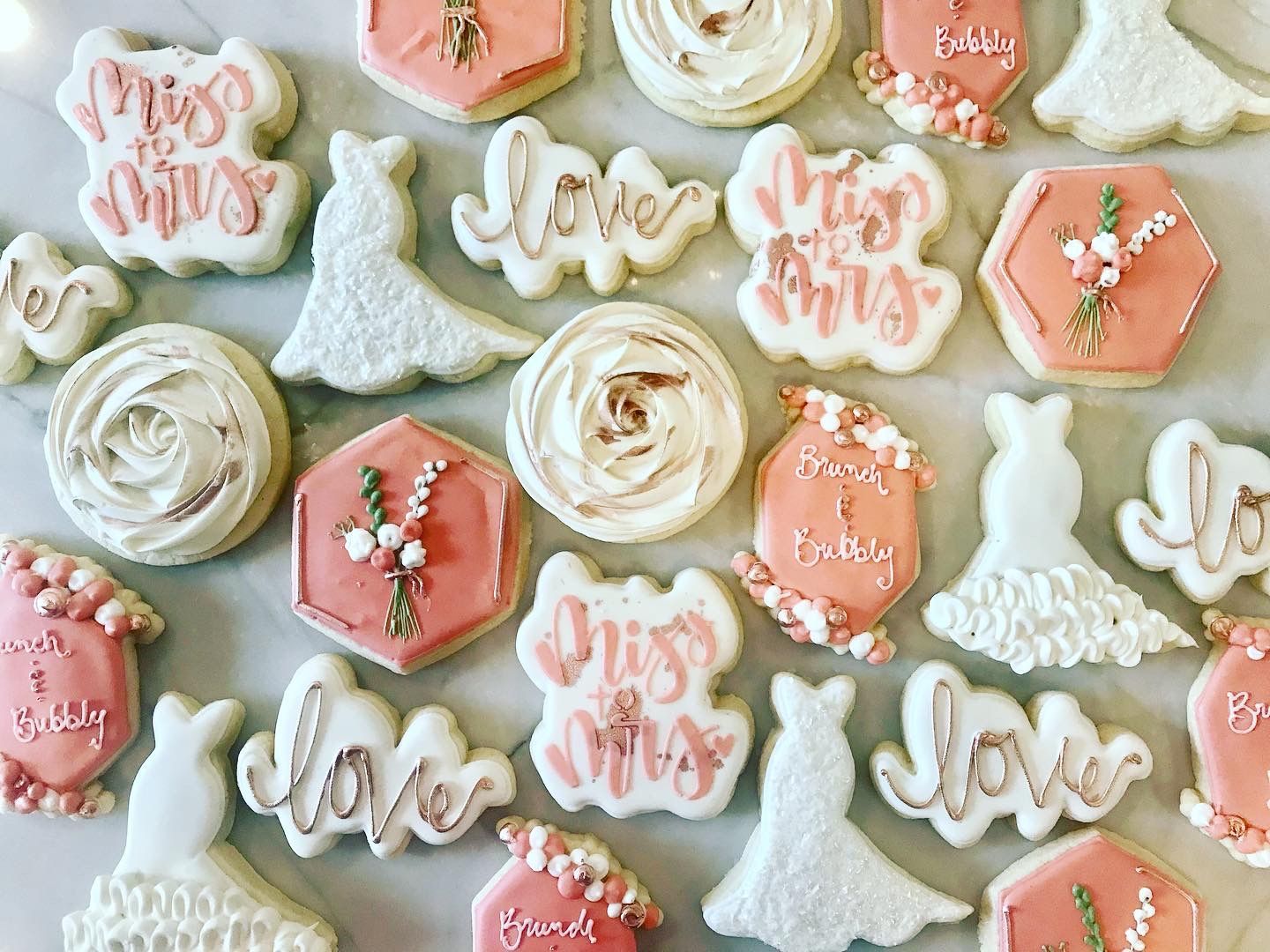 there are many different types of cookies on the table .
