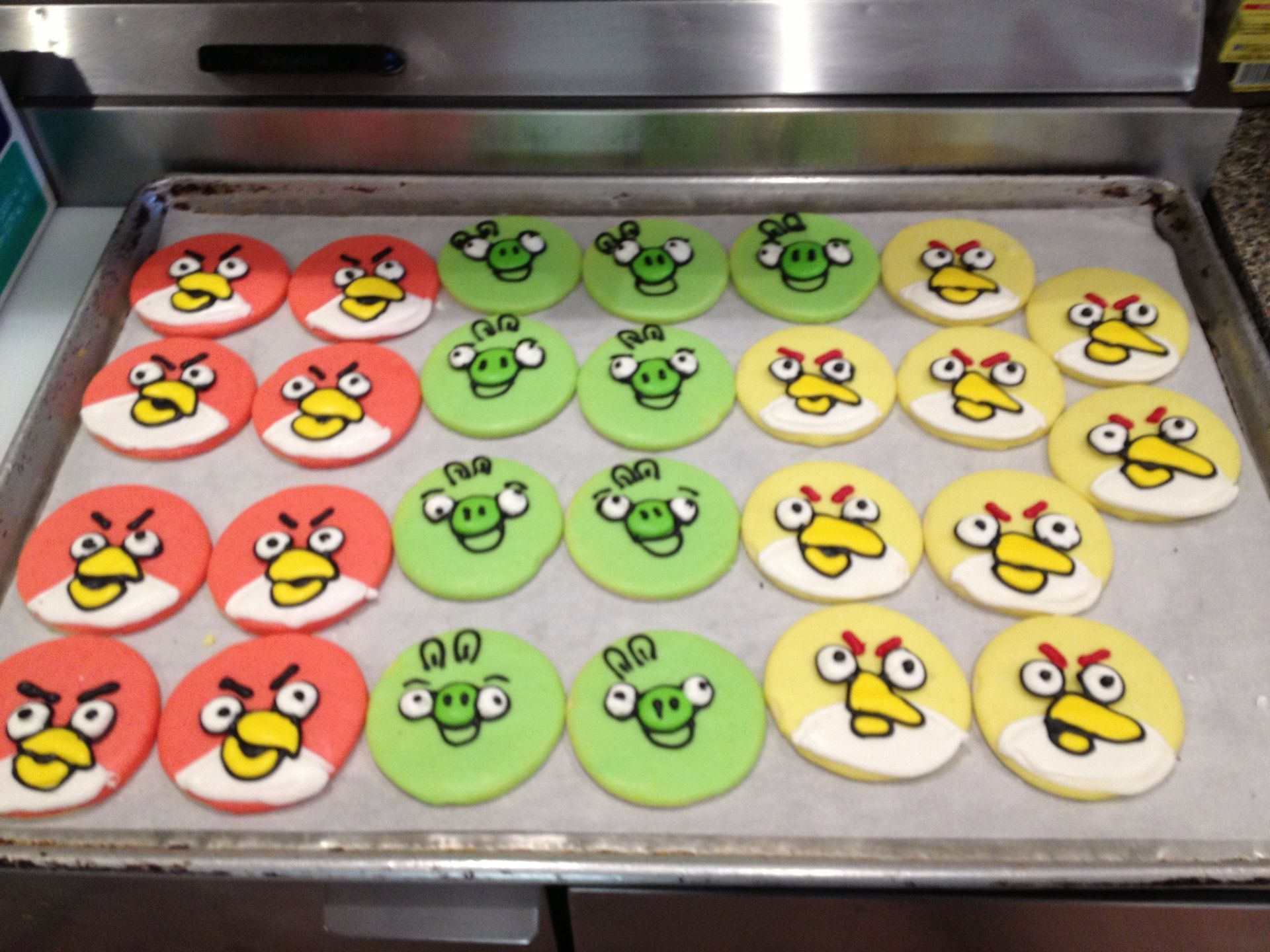 a bunch of angry birds cookies on a tray