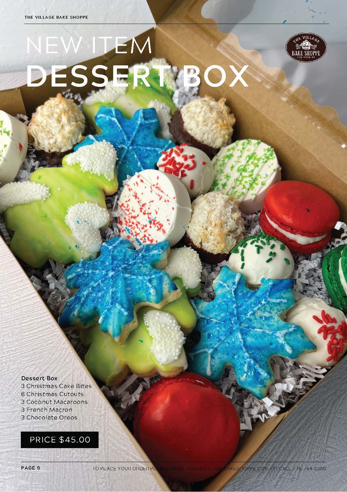 a box filled with a variety of desserts and cookies .
