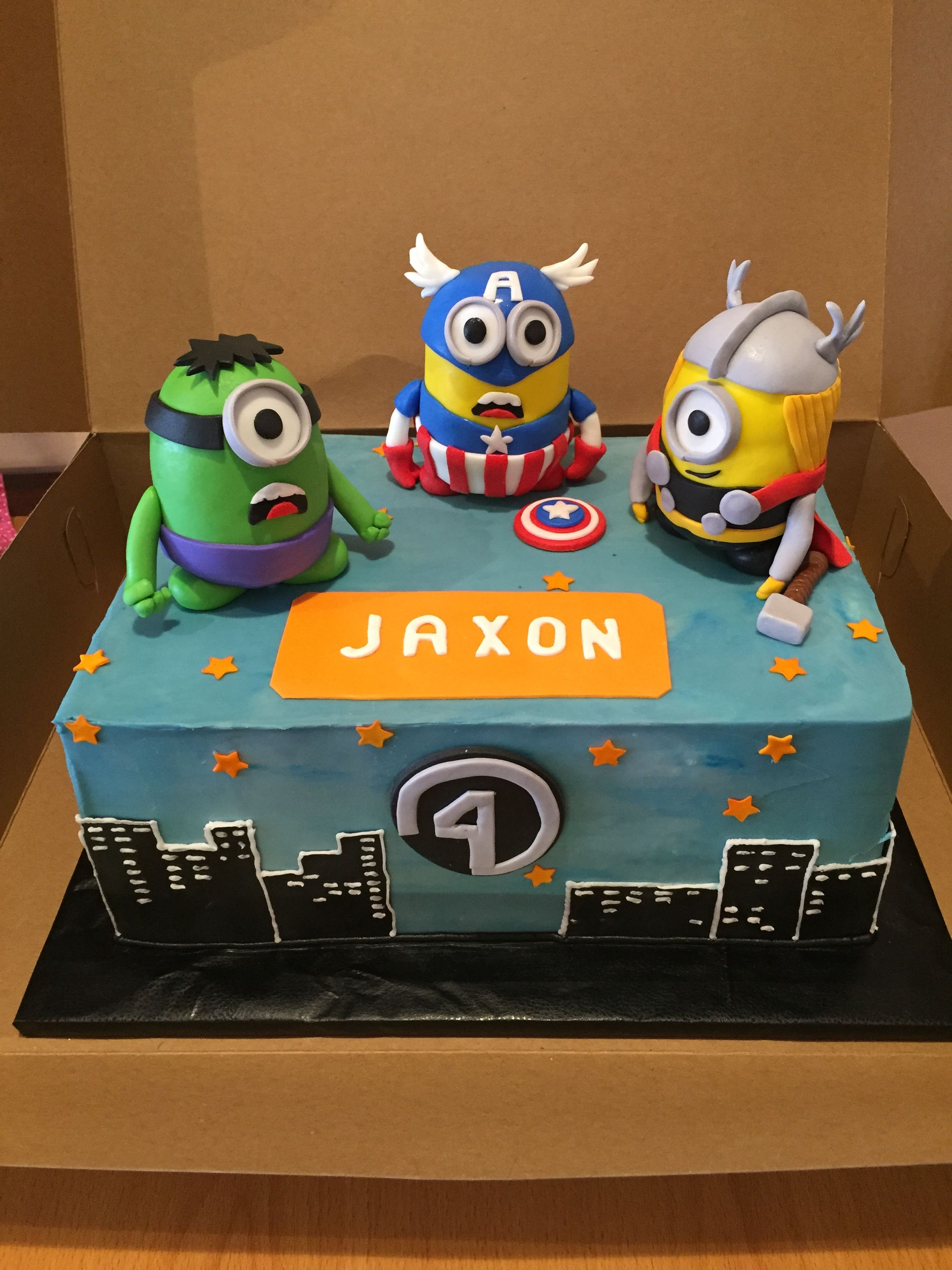a cake with minions dressed as captain america thor and hulk