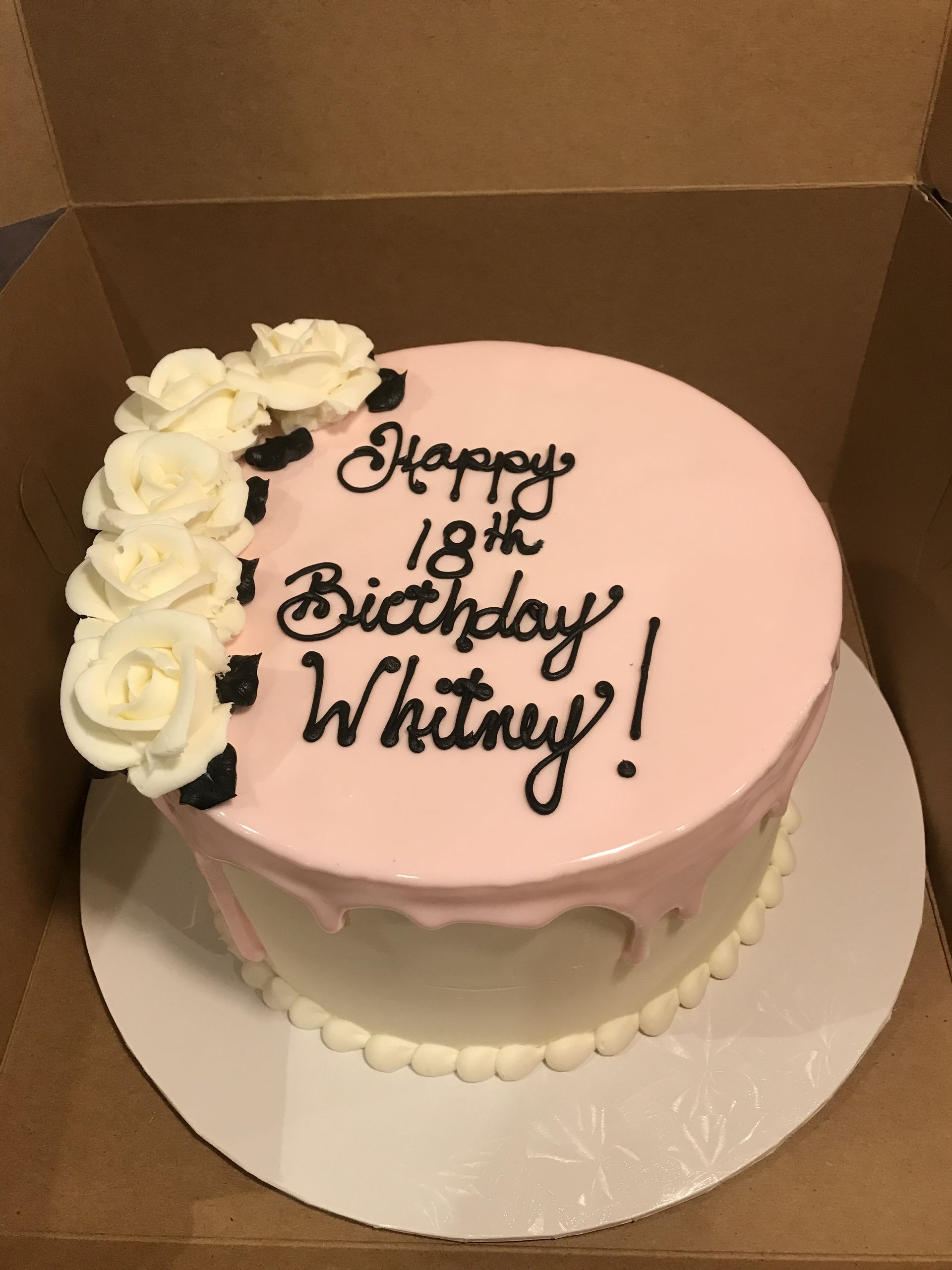 a birthday cake with the name whitney on it