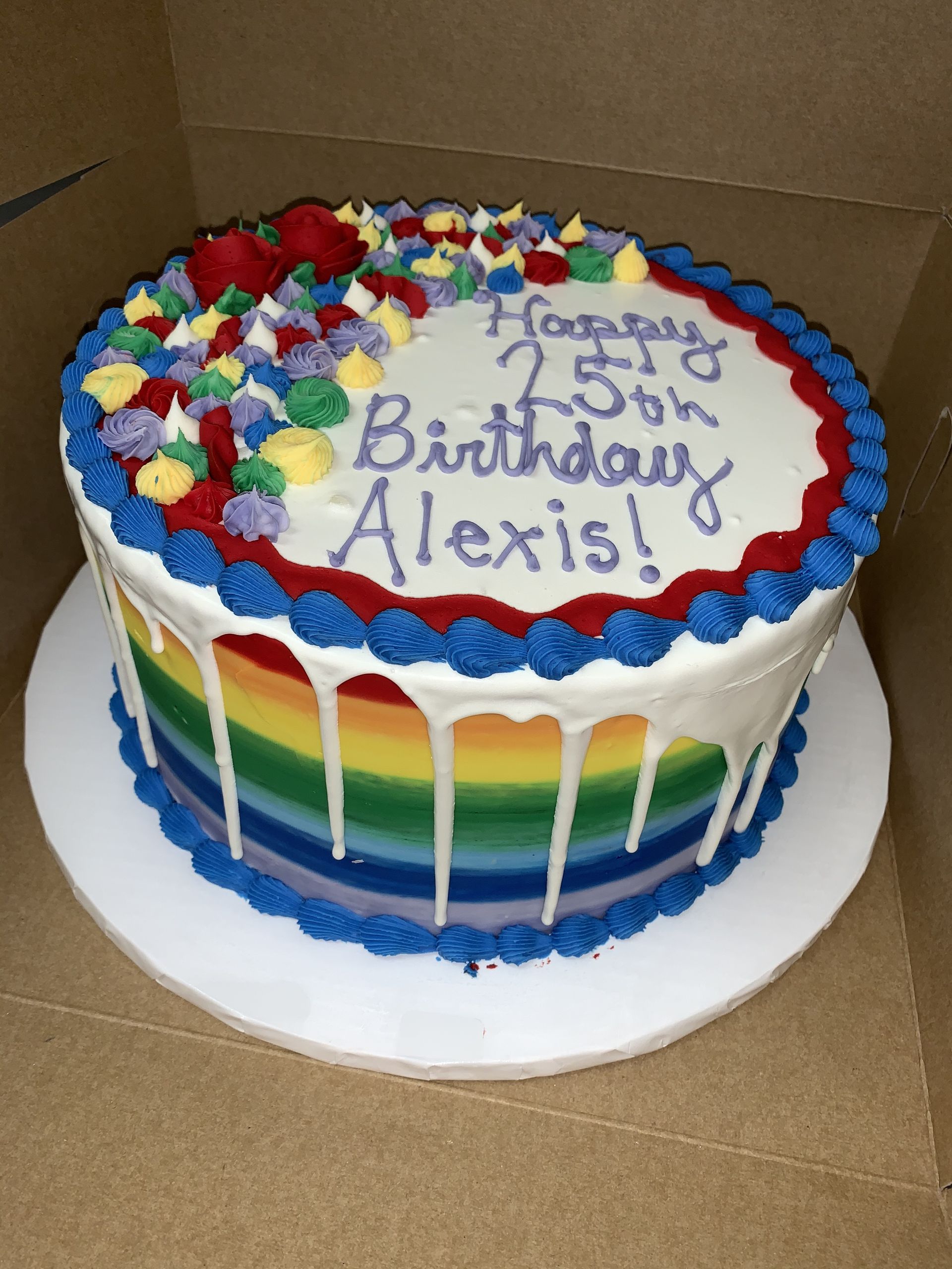 a birthday cake for alexis is in a box
