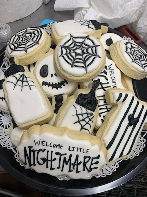 a tray of nightmare before christmas cookies on a table