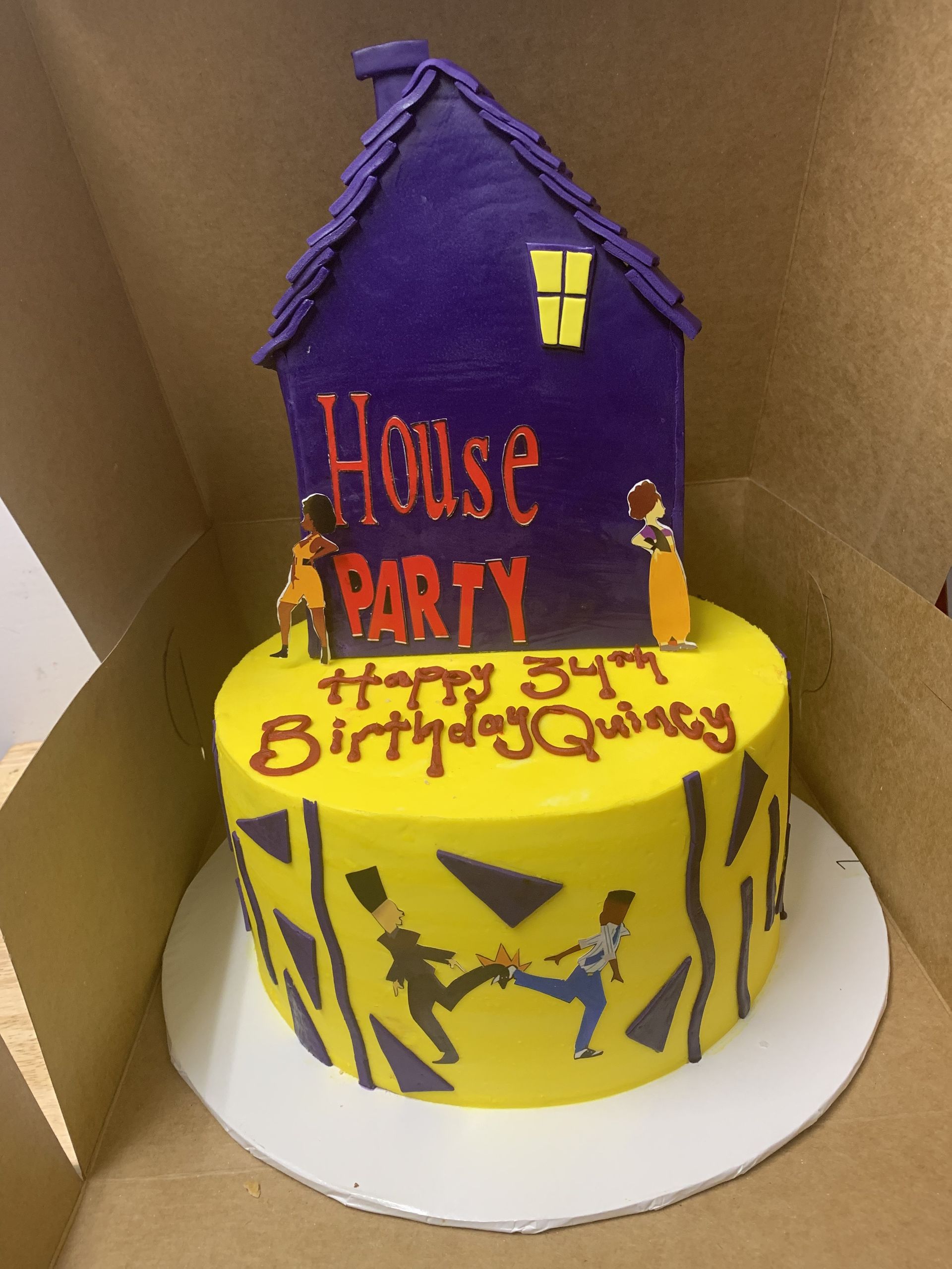 a yellow cake with a purple house on top that says house party