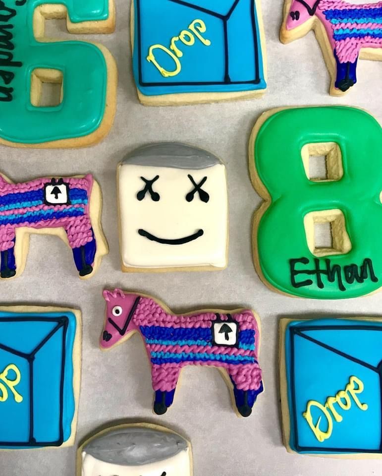 a bunch of cookies with one that says drop on it