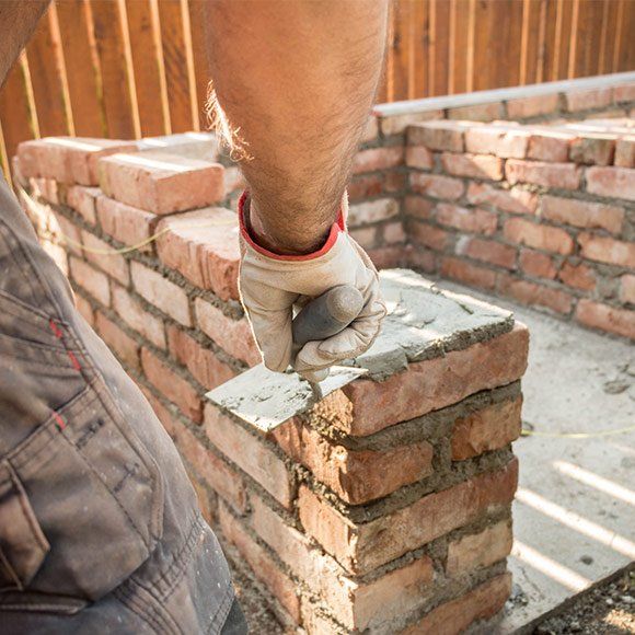Adding Cement On Bricks — Holbrook, MA — F.L. Smith Inc.