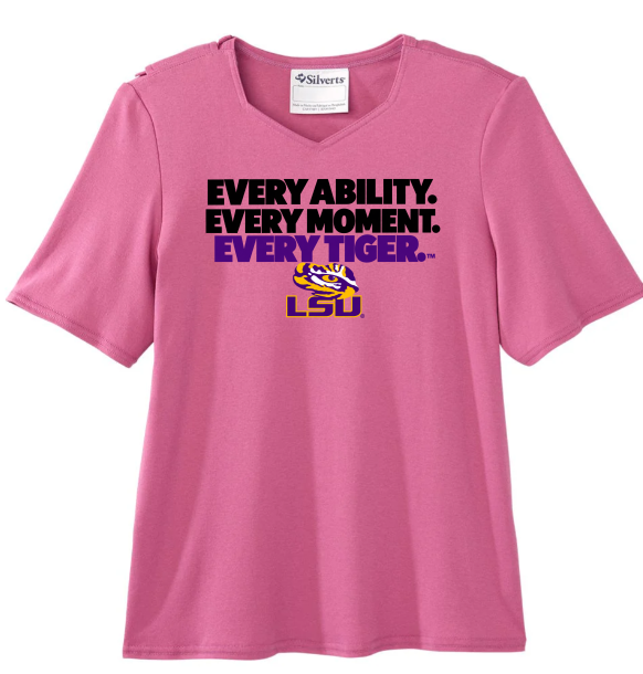 Pink LSU T-shirt with bold black and purple “Every ability. Every moment. Every tiger.” text and logo