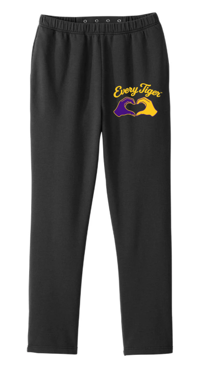 Black jogger pants with yellow and purple logo on the left thigh