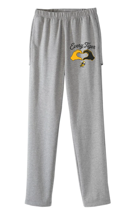 Gray sweatpants with a yellow-and-black cartoon graphic and text on the upper left leg