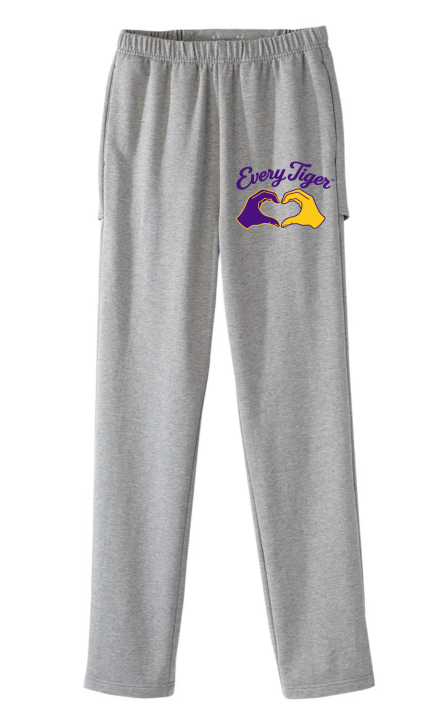 Gray sweatpants with an “Everybody” graphic and purple-yellow sneaker design on the leg
