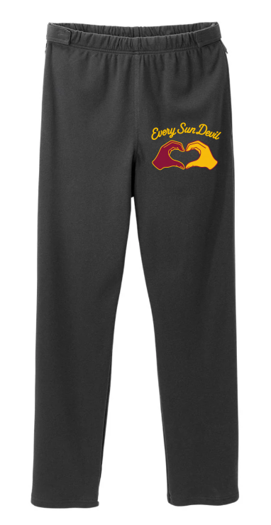 Black sweatpants with a small yellow and red graphic on the left thigh