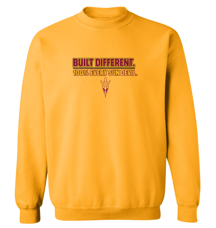 Golden yellow sweatshirt with “BUILT DIFFERENT. 100% EVERY SKIN LEVEL.” printed on the chest