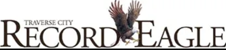 Traverse City Record-Eagle newspaper logo with an eagle graphic between the words
