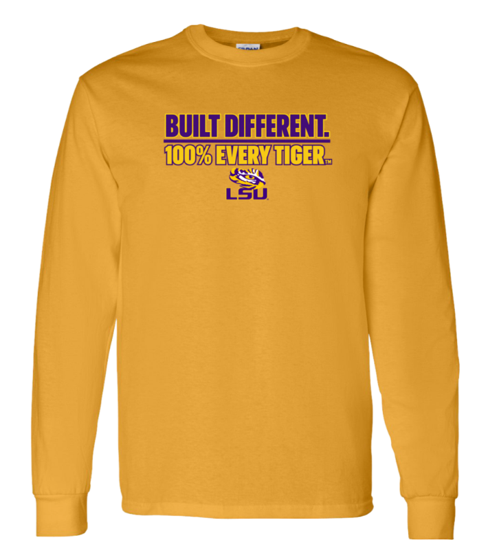 Gold long-sleeve shirt with purple and white “BUILD DIFFERENT. 100% EVERY TIGER.” LSU logo on chest