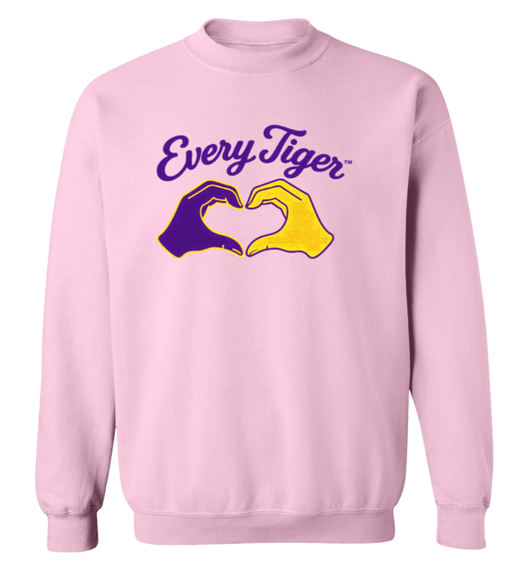 Pink sweatshirt with “Every Tiger” text and two hands forming a heart in purple and yellow