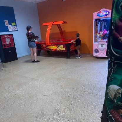 Customer near the pinball machines