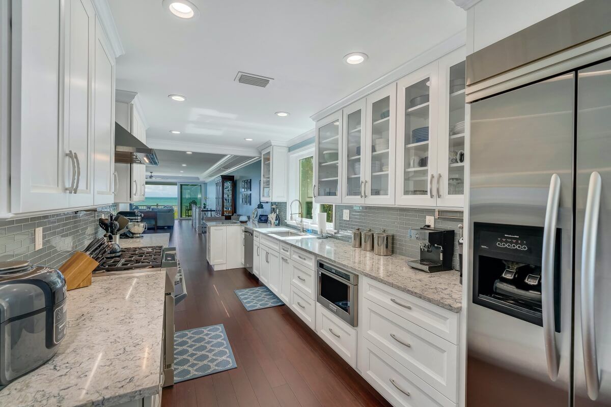 Here is a gray tile kitchen backsplash from a coastal home in Florida