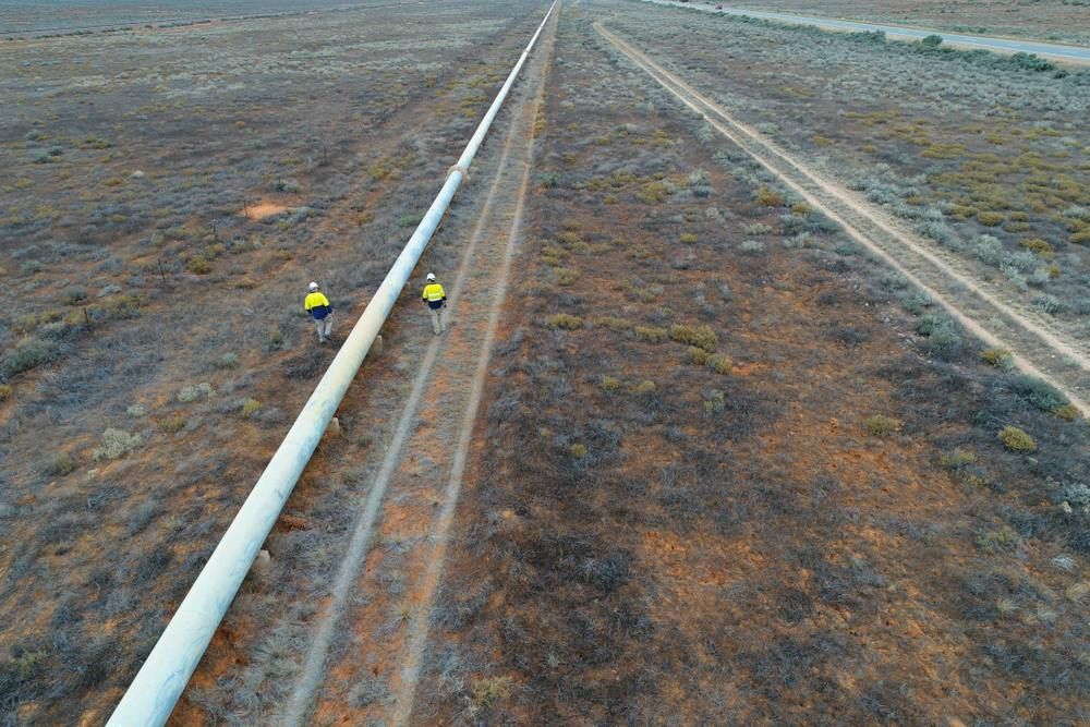 An Aerial View Of A Large Pipe In The Middle Of A Desert — Blackpoly Pipelines in Cowra, NSW