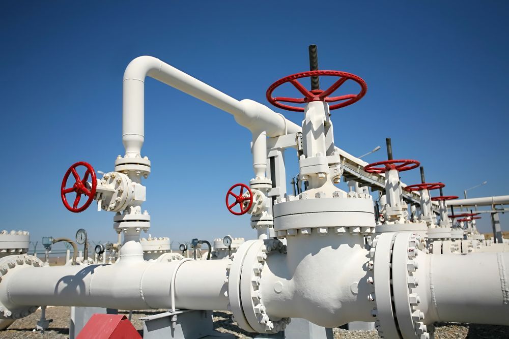 A Bunch Of White Pipes With Red Valves On Them — Blackpoly Pipelines in West Wyalong, NSW