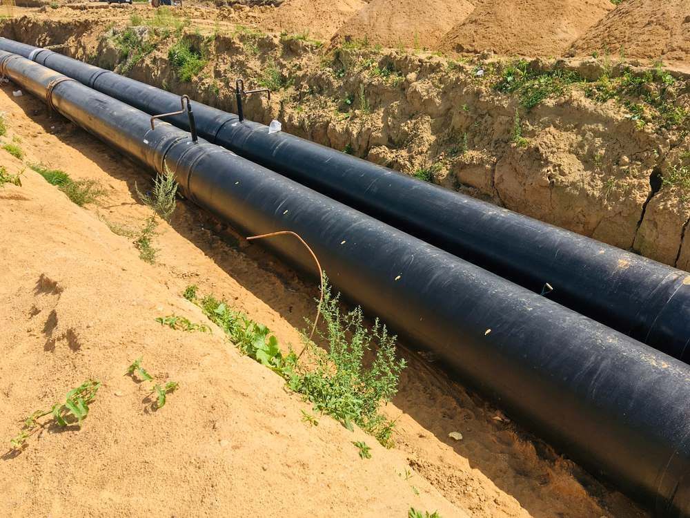 Black Pipes Are Laying In The Dirt — Blackpoly Pipelines in Young, NSW