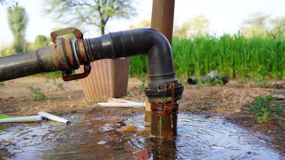 A Water Pipe Is Connected To A Well In A Field — Blackpoly Pipelines in Parkes, NSW