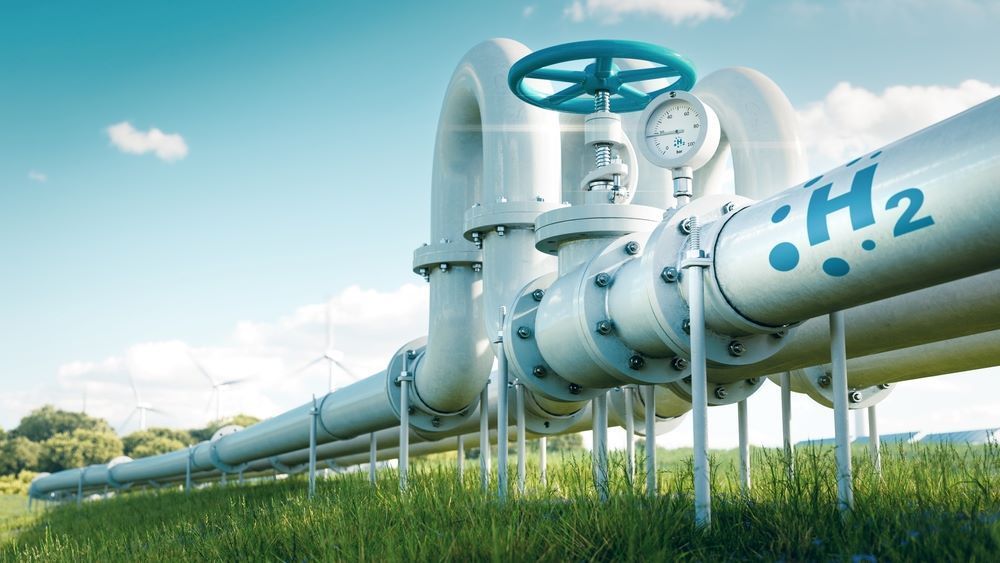 A Row Of Hydrogen Pipes Going Through A Grassy Field — Blackpoly Pipelines in Cloncurry, QLD