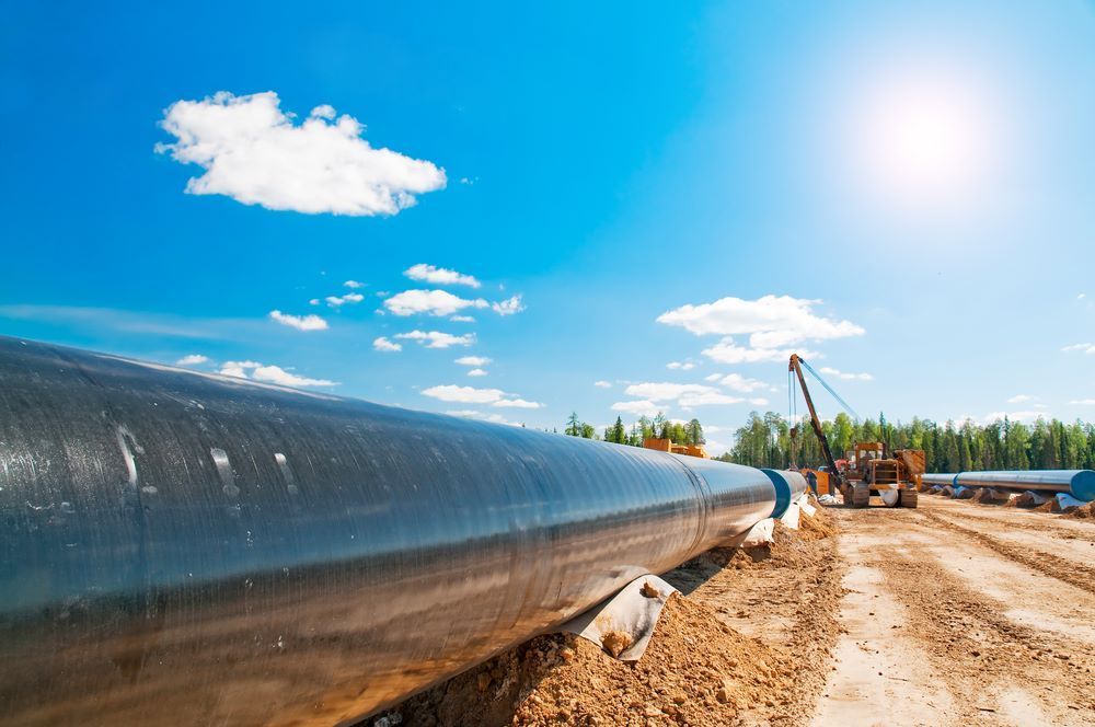 A Large Pipe Is Under Construction On A Dirt Road — Blackpoly Pipelines in Young, NSW