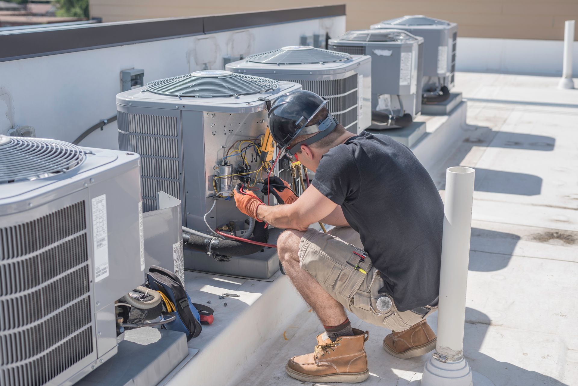Commemrcial HVAC company in Western MA fixing rooftop HVAC system