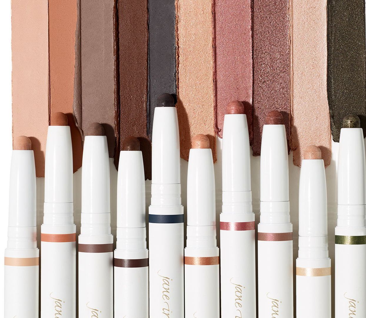 A row of lipsticks with one that says kiss on it — Skin Care Centre of Cairns In Cairns City, QLD