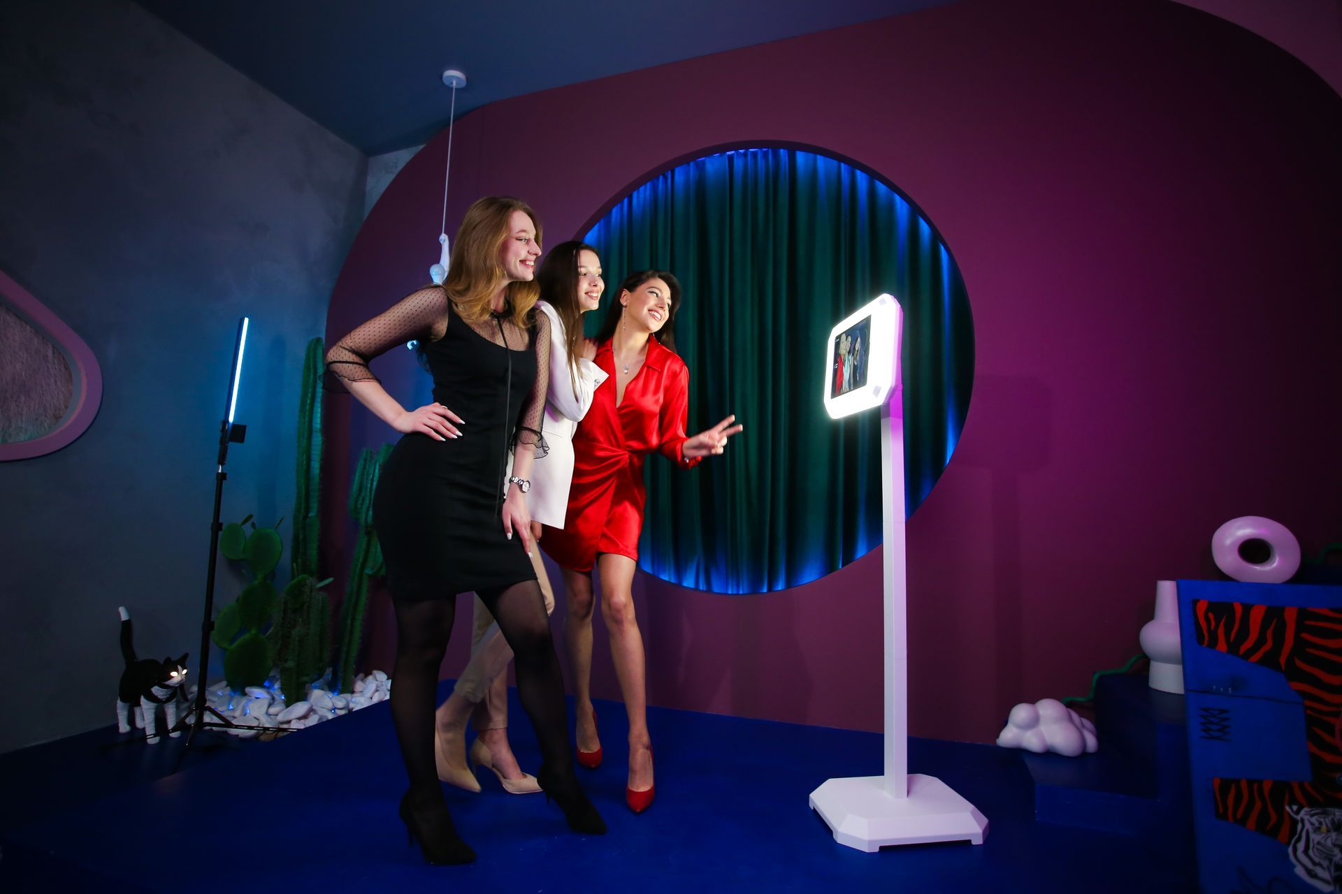 Three Women Are Posing for a Picture