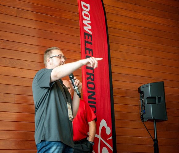 A man speaking into a microphone
