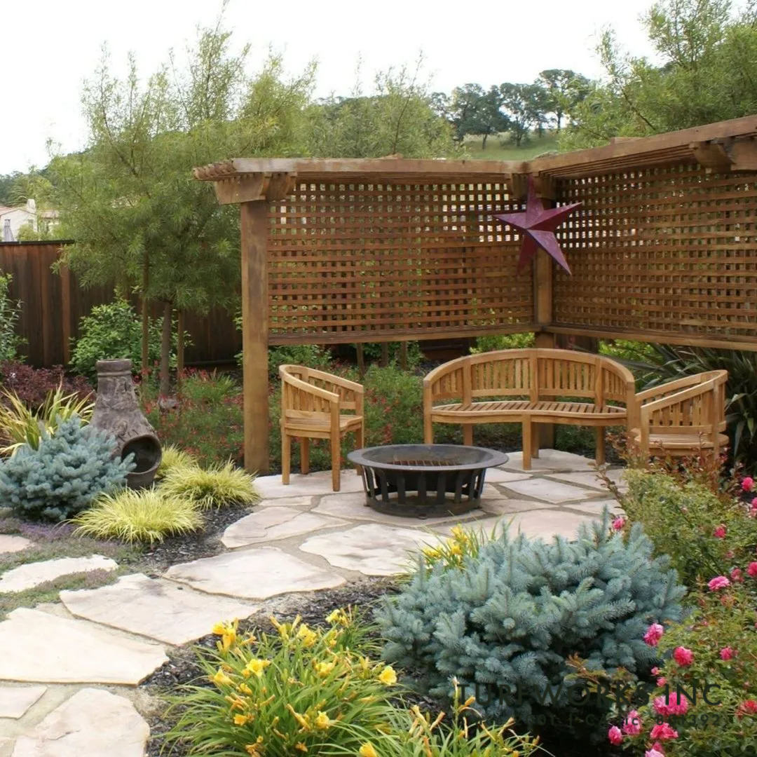 Covered patio and outdoor living space installed by Turfworks Inc, a landscape company serving Napa, CA.